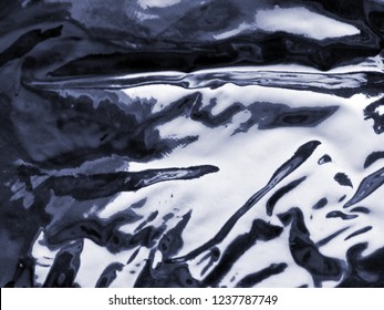 Deep Blue, Black Texture Of Plastic, Latex, Rubber, Caoutchouc, Gum Elastic With White Reflections, Similar To The Sea Water ( Pool ) Waves Texture. Background, Wallpaper.