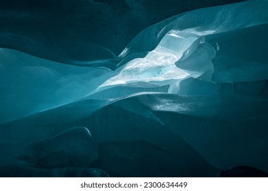 deep blue ice structure in a swiss ice cave in the Valais Alps