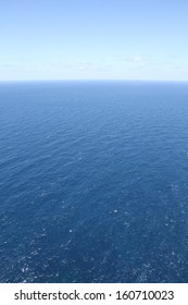 Deep Blue Sea And Bright Sky Taken From A High Position. Wide Angle Shows Horizon Curvature.