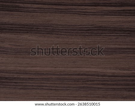 Deep charcoal and onyx striations flow over the ebony veneer, presenting a portrait of dark, natural allure