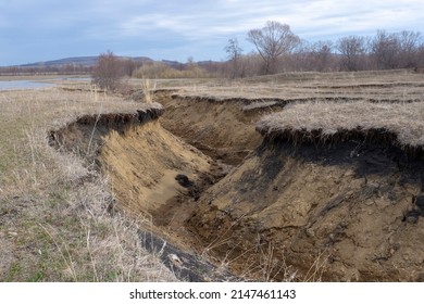 Deep Clay Ravine, Gully. Water Erosion Of The Soil.