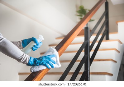 Deep cleaning for Coronavirus disease prevention. alcohol,disinfectant spray on Wipes of Banister in home for safety,infection of Covid-19 virus,contamination,bacteria that are frequently touched - Shutterstock ID 1772026670