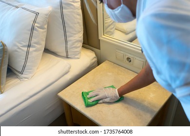 Deep cleaning for Covid-19 (corona virus) disease prevention. For safety, spray alcohol, disinfectant on the cleaning cloth wipes in places that are frequently touched at the hotel.