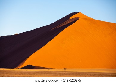 Deep colors of sand dunes during sunset. Sossusvlei, Namibia. - Powered by Shutterstock