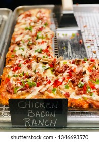 Deep Dish Pizza Slices Chicken Bacon Ranch Square With Sign At Pizzeria