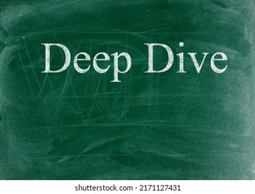 Deep Dive Business Phrase Written In Chalk On A Blackboard