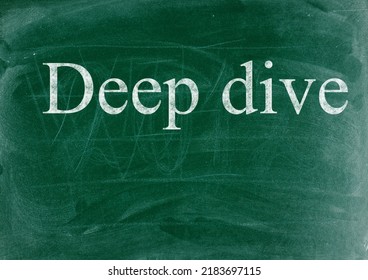 Deep Dive Business Phrase Written In Chalk On A Blackboard