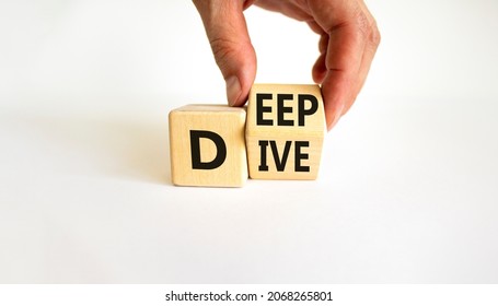 Deep Dive Symbol. Businessman Turns A Wooden Cube With Words 'Deep Dive'. Beautiful White Table, White Background. Deep Dive And Business Concept. Copy Space.