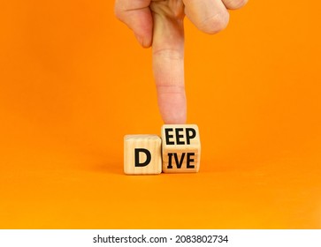 Deep Dive Symbol. Businessman Turns A Wooden Cube With Words 'Deep Dive'. Beautiful Orange Table, Orange Background. Deep Dive And Business Concept. Copy Space.