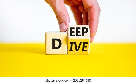 Deep Dive Symbol. Businessman Turns A Wooden Cube With Words 'Deep Dive'. Beautiful Yellow Table, White Background. Deep Dive And Business Concept. Copy Space.