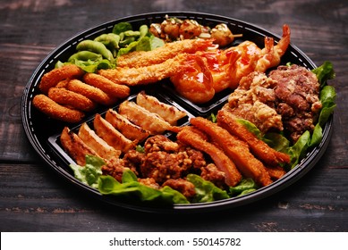 Deep fired platter - squid, chicken, prawn, dumpling platter - Powered by Shutterstock