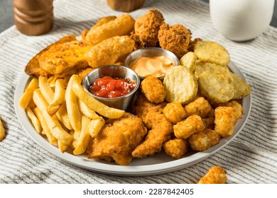 Deep Fried Appetizer Platter with French Fries Tots Mozzarella Sticks and Chicken - Shutterstock ID 2287842405