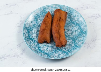 Deep Fried Brinjal Pakora Or Beguni Served In A Dish Isolated On Background Top View Of Indian And Bengali Food