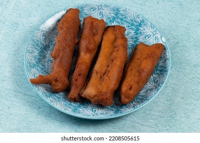 Deep Fried Brinjal Pakora Or Beguni Served In A Dish Isolated On Background Top View Of Indian And Bengali Food