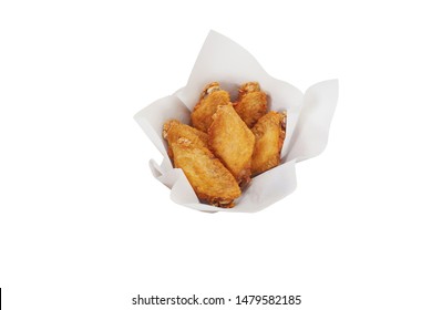 Deep Fried Chicken Wing With Fish Sauce On Oil Blotter Paper, Isolated On White