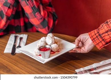 Deep Fried Donut Holes. Doughnut Holes Covered In Powdered Confectionary Sugar. A Fattening But Delicious Brunch Or Breakfast Treat.