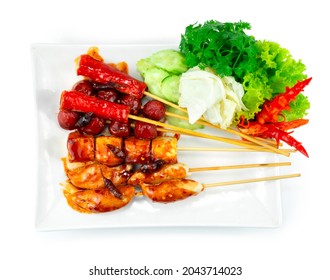 Deep Fried Mixed Meatballs In Skewers With Fry Chili Spicy Sauce Thai Street Food Popular Decoration Vegetables And Carved Chili Topview