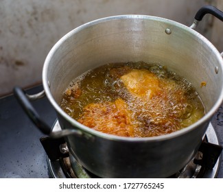 Deep Fried Pork With Hot Oil In Pot,Fritter.