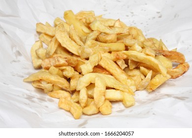 Deep fried potato chips from an English Fish and Chips shop