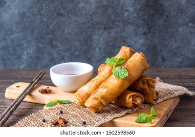deep fried spring rolls, Por Pieer Tod or Fried spring rolls (Thai Spring Roll) Snacks and snacks that are popular with Thai and Chinese people. - Shutterstock ID 1502598560