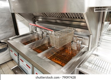 Deep Fryer With Oil On Restaurant Kitchen