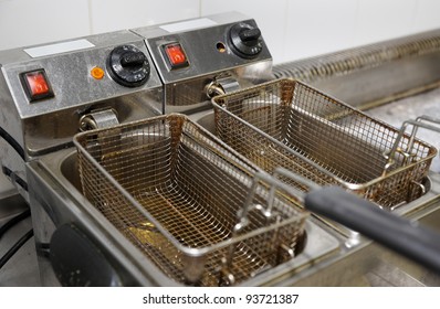 Deep Fryer With Oil On Restaurant Kitchen