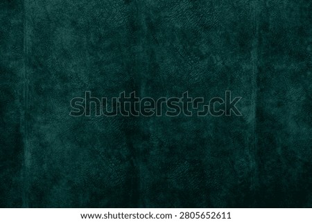 Deep green texture forms a calming backdrop suitable for artistic endeavors.