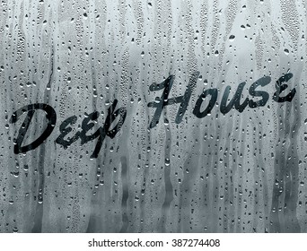 Deep house written on a foggy window