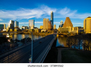 Deep Perspective Austin Texas South Congress Avenue Aerial Fly Hover Shot looking at State Capital Building. Sunset Glow hits the downtown Skyline Cityscape a dramatic Urban ATX shot. 