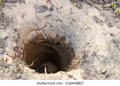 Deep Pit In The Ground. Digging A Hole. Water Well Drilling, Dig A Well For Water, Groundwater Hole Drilling Machine. Big Bottomless Hole In The Ground