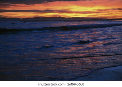 Deep purple and orange sunset looking towards Anacapa Island, Ventura, California, USA, 12.16.2013