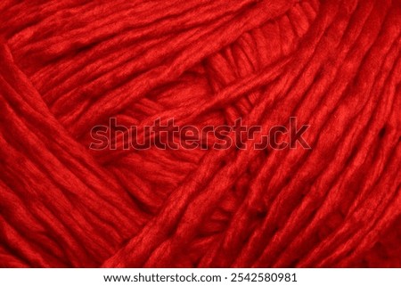 Deep red wool yarn texture suitable as background concept
