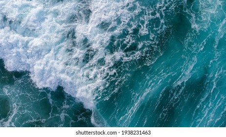 Deep Sea Foam Crashing Near The Shore