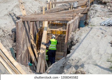 Deep Trench Shoring To Avoid Risks Of Landslide. Walls With Supports To Prevent Sloughing Of The Soil. Trenching And Excavation Safety.