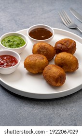 Deep-fried Potato Bread Rolls With Sauces