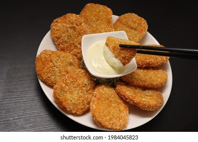 Deep-fried Prawn Cutlets On Black Background