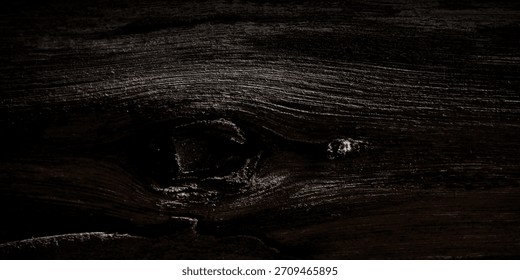 Deeply textured and dramatic dark brown tree bark or wood surface, featuring a rough grain, deep crevices, and a heavy vignette that creates a moody, mysterious background
