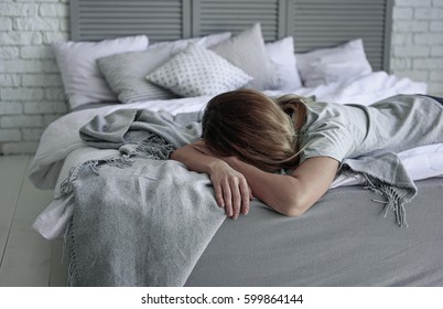 Deeply Upset Woman On Bed