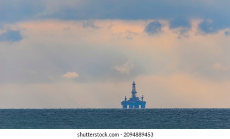 Deepwater Oil Platform On The Horizon At Sea