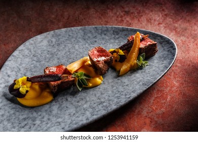 Deer Sirloin With Sweet Potato Puree, Blanched Purple Carrots, Wine Jam With Quince