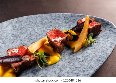 Deer Sirloin With Sweet Potato Puree, Blanched Purple Carrots, Wine Jam With Quince