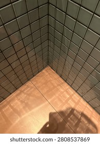 The Deets Of The Nook. Small white ceramic tiles as wall covering material meets terracotta ceramic floors.