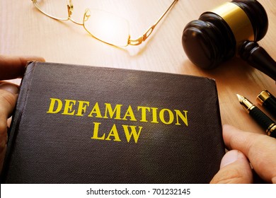 Defamation Law And Gavel On A Table.