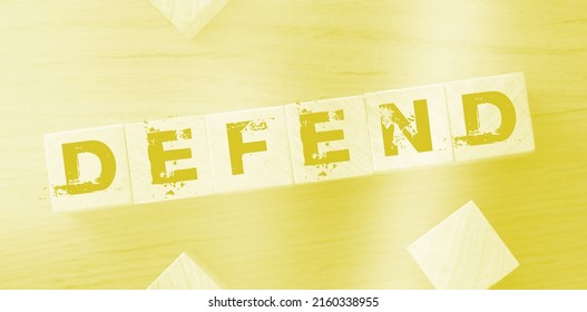 defend-word-on-wooden-cubes-stock-photo-2160338955-shutterstock