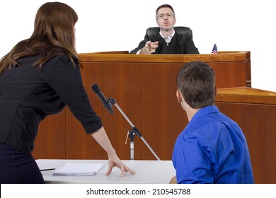 Defendant With Lawyer Speaking To A Judge In The Courtroom