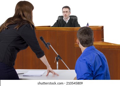 Defendant With Lawyer Speaking To A Judge In The Courtroom