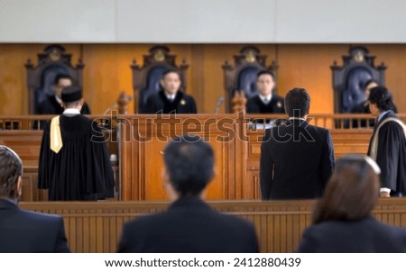 defendant talks to the judge in courtroom. The concept of legal adjustment Court of Justice and Legal Trial Speech to Judge Lawyer Lawyer Protects Client with Argument