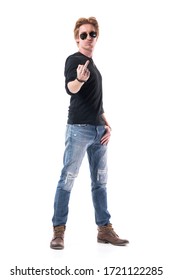 Defiant Handsome Redhead Young Rocker Man Showing Rude Middle Finger Gesture At Camera. Full Body Isolated On White Background. 