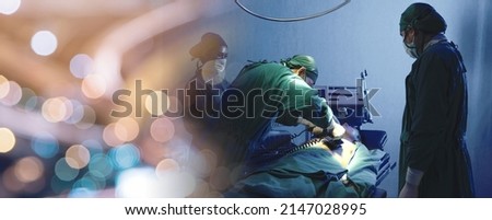 Defibrillation cardiac dysrhythmia, Surgical doctor team performing surgery patient on operating room in hospital, doctors use medical devices automated External Defibrillator to pump hearts patients