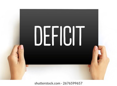 Deficit - the amount by which something, especially a sum of money, is too small, text concept on card